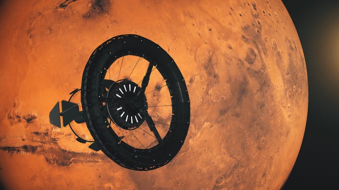 an illustration of a space station with a large rotating ring orbiting above Mars