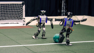 robots playing soccer