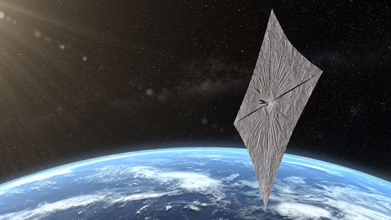 The Lightsail 2 orbits high above the Earth. The spacecraft is a square swatch of shiny, metallic film. 