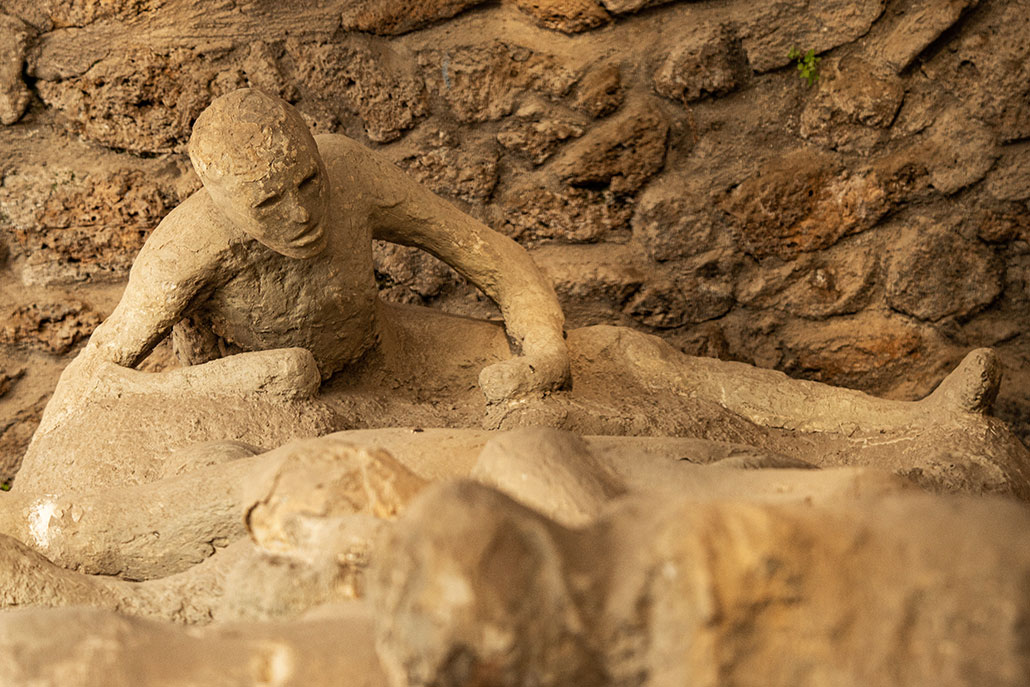 a photo of a cast of a person buried in Pompeii's ash