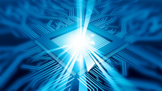 a computer illustration of a computer chip on motherboard, the chip is emitting light