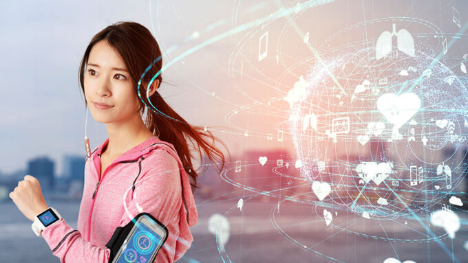 a photo of an asian woman with long hair in a ponytail running, she has a smartwatch and a phone strapped to her arm. Behind her is an illustration of the idea of the Internet, a glowing sphere wireframe connected to devices, emoji, people, places and so on