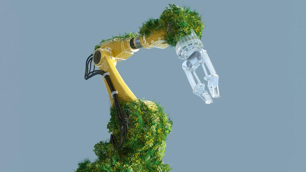 Green plants grow on a yellow robotic arm with clear claws.