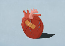 An illustrated human heart sits against a light blue background. A beige bandaid is attached to the front to suggest it is a broken heart.