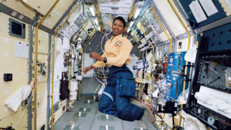 astronaut Mae Jemison floats weightless in the science module of the space shuttle Endeavor during a trip to space in 1992